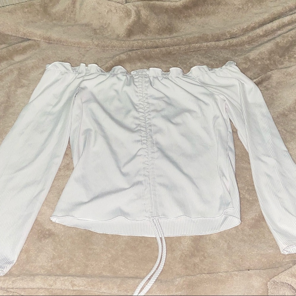 White off the shoulder, long sleeve.